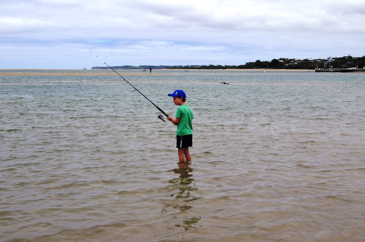 Grrrr the water's cold but I know there are fish here.jpg